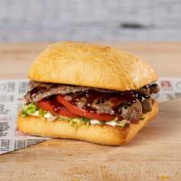 Tri-Tip Sandwich · Hand cut tri-tip steak with crisp lettuce, tomato, mayo, and your choice of BBQ or teriyaki ...