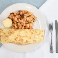 Savory Crepe Plate · Crepe filled with scrambled eggs, diced ham, spinach, mushrooms and Swiss cheese; topped wit...