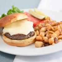 Blue Moon Burger · 7 Oz. all beef hamburger patty cooked to order on a sesame brioche bun. garnished with grill...