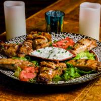 Chicken Wings · Marinated in garlic and lemon sauce and charcoal grilled.