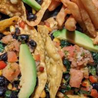 Vegan Tacos · Three tacos packed with black beans, Pico de Gallo, avocado, tofu, shredded lettuce and cove...