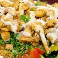 Chicken Shawarma · Thin sliced slowly roasted marinated
chicken breast