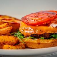 Beyond Soul Burger & Fries · Soul seasoned beyond patty, vegan mayo, vegan cheddar cheese, onion, tomato, lettuce & seaso...