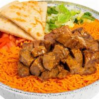 Savory Herb Beef Platter · Tender, seared sirloin marinated in a Savory spice blend atop a bed of basmati rice and serv...