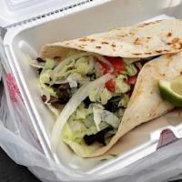 Burrito De Carne Asada · Grilled steak burrito.