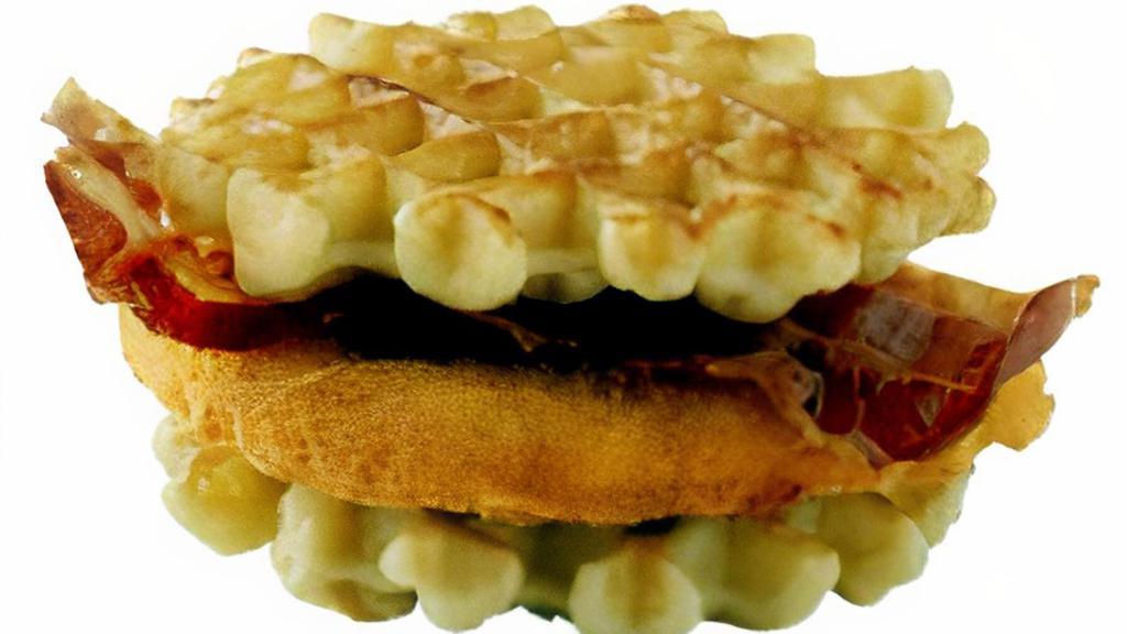 Chicken And Waffles Slider Cal 390 · Crispy chicken breast sandwiched between two fluffy Belgian Waffles and topped with bacon.
