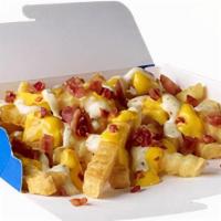 Loaded Fry With Bacon, Ranch And Cheddar Cheese Cal 460 · Crispy fries topped with thick-cut bacon crumbles, melty cheese and ranch sauce.