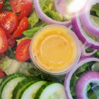 Fresh Green Salad · Fresh Romaine Lettuce with Red onion, Grape Tomato, Cucumber Slices and Dressing of Your Cho...