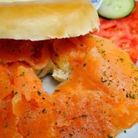 Lox Bagel Sandwich · Smoked Salmon,
Red Onion,
Caper,
Cucumber, 
Tomato,
Cream Cheese,
Bagel of your choice
