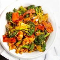 Stir-Fried Broccoli With Chicken · House brown sauce, broccoli, white onion, carrots.