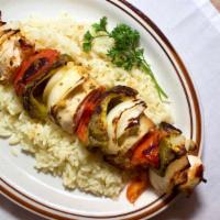 Chicken Kabob (11Am-9Pm) · Chunks of Chicken on a skewer with onions, green peppers, and tomatoes served over rice. Com...