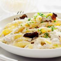 Penne Truffle Pasta · Cylinder-shaped pieces of pasta, Italian sausage, portobello mushrooms, white truffle oil, a...
