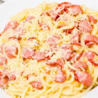 Spaghetti Truffle Pasta · Long, thin, solid, cylindrical pasta, Italian sausage, portobello mushrooms, white truffle o...