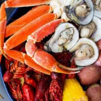 Steamed Seafood Platter For Two · Colossal head-on shrimp, one crab. cluster, oysters, mussels, and hot boiled. crawfish with ...