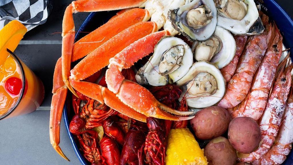 Steamed Seafood Platter For Two · Colossal head-on shrimp, one crab. cluster, oysters, mussels, and hot boiled. crawfish with corn & potatoes.. **Gulf shrimp will be substituted for crawfish when crawfish are not in season**