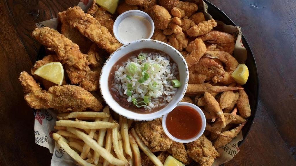 Big Fried Seafood Platter · Shrimp, catfish, oysters, fried gator bites and blue crab claws. Served with fries & hushpuppies. Choice of side.