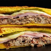 Media Noche · Soft and sweet bread. Our Cuban sandwich on egg yellow bread for softer texture and sweeter ...