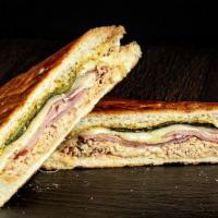 Turkey Cuban · 100% Turkey! House roasted turkey breast, Smoked turkey, melted swiss cheese, pickle and mus...
