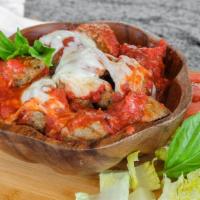 Meatball · 4 meatballs in marinara sauce with topped lots of melted mozzarella cheese