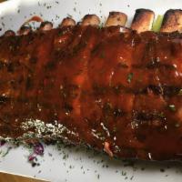 Bbq St. Louis Ribs · Slow roasted, tangy bbq sauce, fries, and slaw.