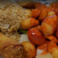 Sweet & Sour Chicken · Served with fried rice egg roll and chicken wing.