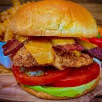 Chicken Club Sandwich And Fries  · Our Chicken Sandwich with mayo, cheese, bacon, lettuce, tomato and pickle, served with frenc...