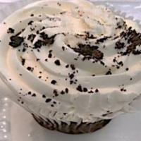 Oreo® Cookie Cupcake · A rich chocolate cupcake topped with vanilla cream and real OREO® cookie bits.