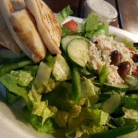 Greek Salad · Romaine lettuce, tomatoes, cucumbers, bell peppers, Kalamata olives, onions and feta cheese....