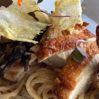 Wild Mushroom And Chicken Yakisoba · Japanese style noodles, crispy shallots, creamy wild mushroom sauce, white truffle oil and c...