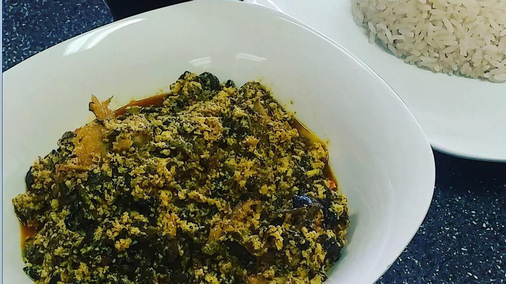 Egusi · Spinach stew thickened with ground melon seeds cooked in
red oil with pepper, dry kinney fish, and stockfsh and served
with rice or fufu. Beef, cow, chicken, hen, and turkey can be
added.