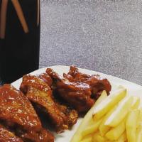Wings With Fries · Hot wings tossed with spiced barbecue sauce and served with a side of
fries.