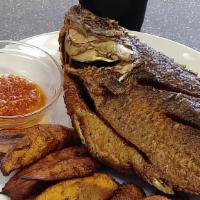 Plantains With Fried Fish · Fried plantains served with fried fish (tilapia or mackerel), and pepper
sauce.