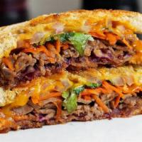Thaiger Is Crying Sandwich (Thai Marinated Roast Beef Sandwich) · Thai style marinated roast beef, carrot, red cabbage, red onion, cilantro, cheddar dressed w...