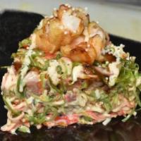 Poseidon Salad · Wakame, masago, tuna, salmon, steam Shrimp, Mayo, Scallions, sesame seeds and eel sauce