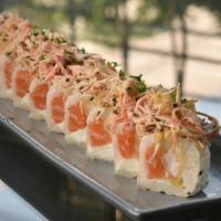 Narita Roll · 10 pieces with Kanikama salad, tempura flakes, salmon, tobiko, shrimp tempura, cream cheese ...