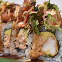 Neptuno Roll · 10 pieces with Shrimp tempura, seafood mix, avocado, seaweed salad mix with kanikama, salmon...