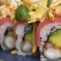 Acevichado Roll · 10 pieces with Shrimp tempura, avocado, tuna, maíz cancha, white fish, leche de tigre, red o...