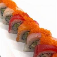 Three Kingdom Roll · Crab Salad Mix, Cucumber, Avocado inside, Tuna, Salmon, Yellowtail Outside, Tobiko Top