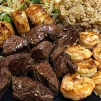 Sumo · Filet Mignon, Shrimp, scallop.
Served with mixed Veggies and steamed rice.