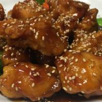 Sesame Chicken · Deep-fried battered chicken seasoned with sesame sauce. Served with steam rice.