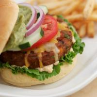 Southwestern Veggie Burger · Made with black beans and topped with cucumber, avocado, Cheddar Jack cheese, chipotle aioli...