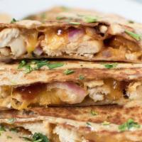 Barbecue Chicken · Grilled chicken, Sweet BBQ sauce, red onions, fresh cilantro and Cheddar Jack in a whole whe...