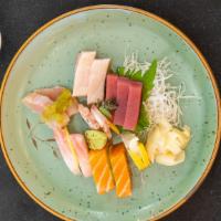 Sashimi Sampler · Twelve pieces (chef's choice) sashimi. exclude soup and salad.
