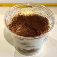 Tiramisu · Lady fingers dipped in espresso, cream of mascarpone and cocoa powder.
