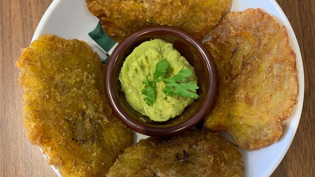 Tostones (5 Uds) · Fried green plantains.