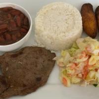 Bistec Encebollado · ARROZ BLANCO FRIJOLES DEL DIA ENSALADA DEL DIA TOSTONES