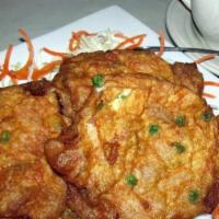 Kong'S House Egg Foo  Yong · Pork,chicken and shrimp  with onion, green onion and bean sprouts