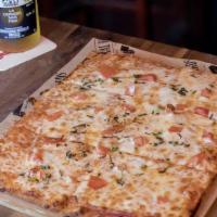 Flatbread Margherita Pizza · Thin crust flatbread pizza with mozzarella cheese and marinara sauce. Topped with chopped to...