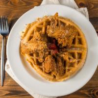 Chicken & Waffles · 3 Lightly breaded whole chicken wings served with a homemade waffle and maple syrup.