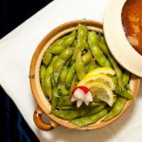 Spicy Edamame · Steamed edamame tossed in our signature spicy sauce.